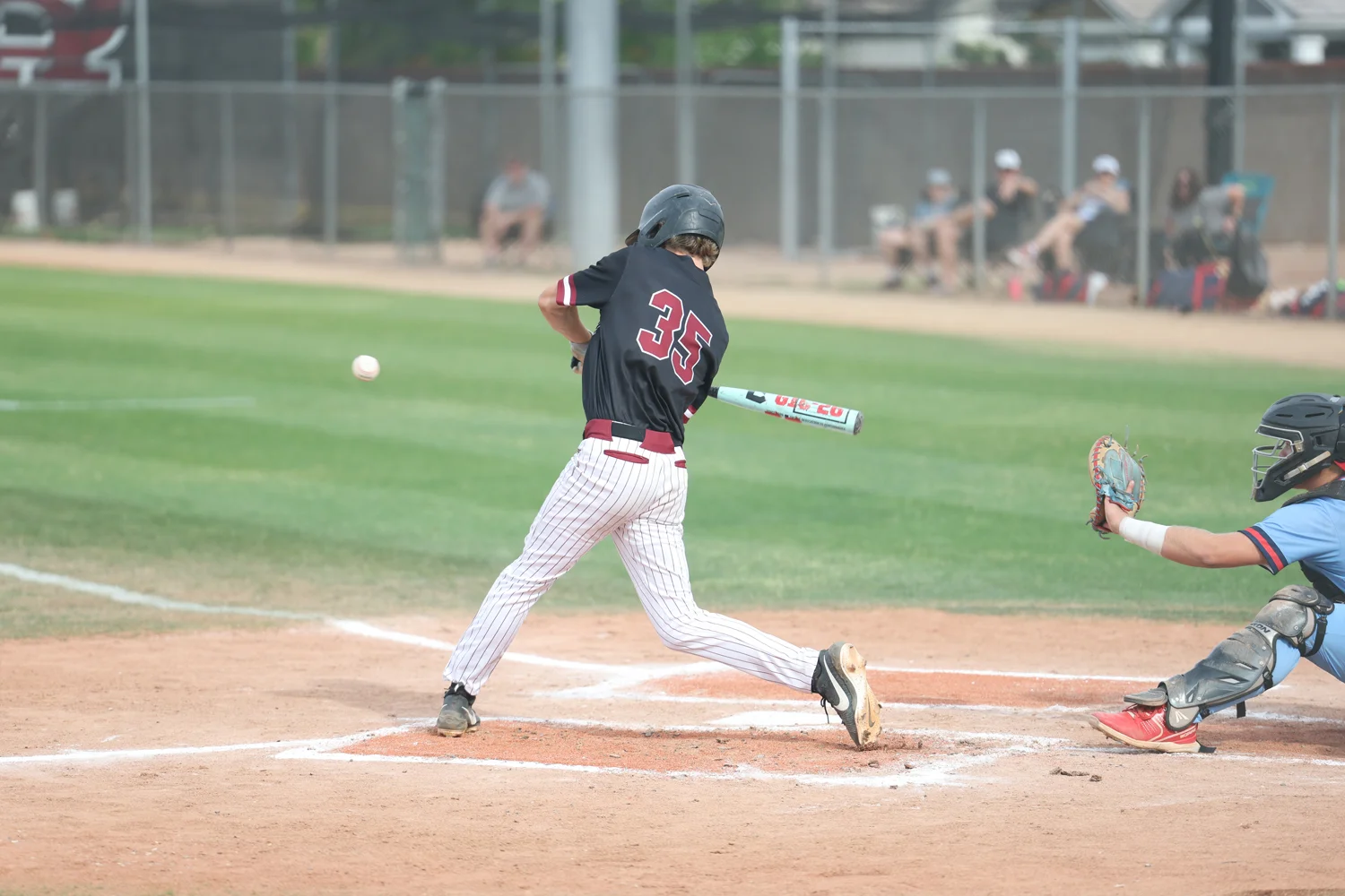 Taking a swing at the ball
